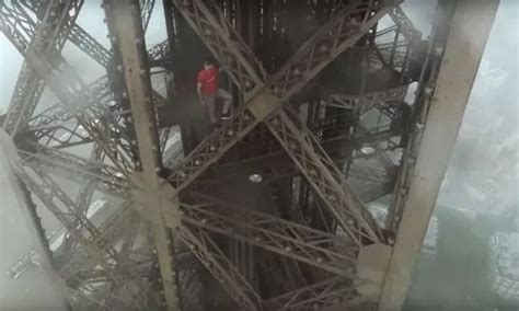 daredevils sneak into eiffel tower in dead of night to scale famous landmark without harnesses