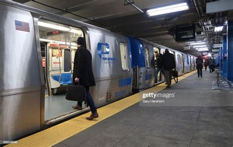 People Board A Path Subway Train At The 33rd Street Station On March