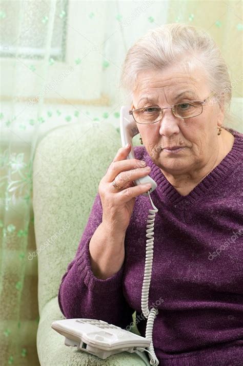 Mature Woman Age 70 75 Years Speaking On The Phone Stock Photo By
