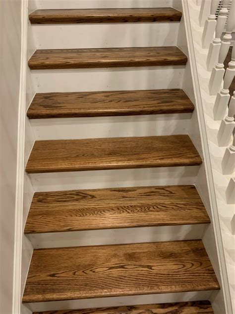 Wood Stair Treads Installed And Stained Them To Match Coretec Lvp