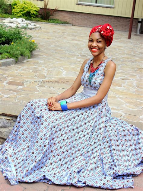 The play on them is what makes this. Long African Dress With Front Knotted Scarf