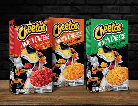 Three Boxes Of Cheetos Cereal Sitting On Top Of A Wooden Table