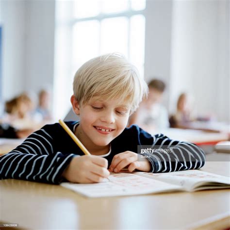 Boy Sitting In School Class High Res Stock Photo Getty Images