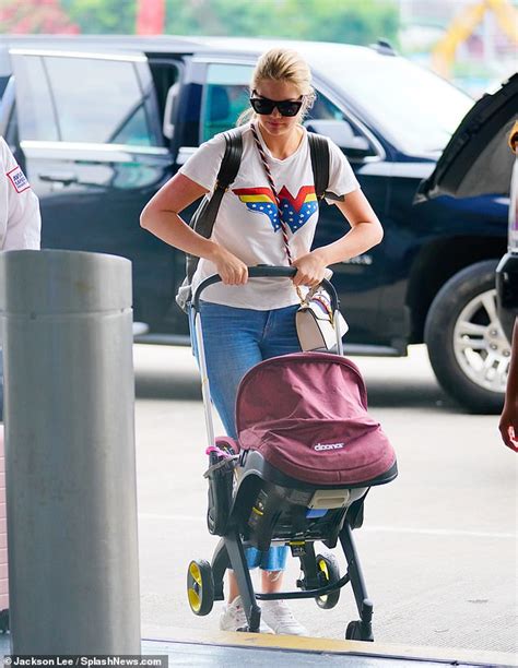 Kate Upton Stuns In Athletic Ensemble As She Cradles Daughter Genevieve