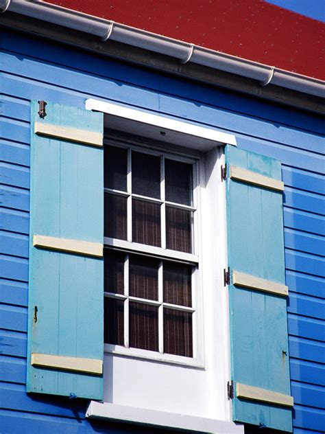 Window company riviera beach wood architecture garden windows black windows exterior cladding boynton beach palm beach gardens display. Storm Shutters Minimize Damage | HGTV