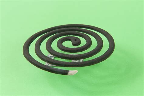 Mosquito Repellent Coil Emit Smoke To Repel Mosquito On Green