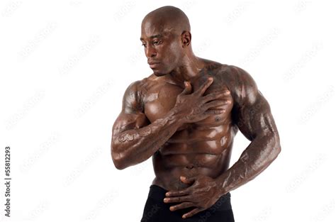 Black Bodybuilder Pouring Oil On His Muscles Strong Man Stock Photo Adobe Stock