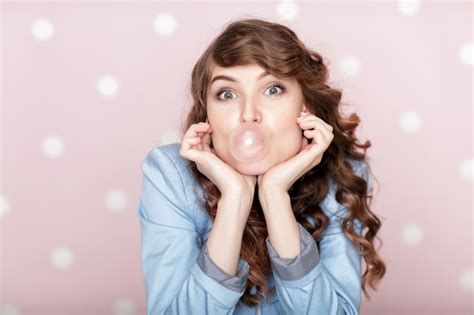 Premium Photo Woman Doing Bubble With Chewing Gum