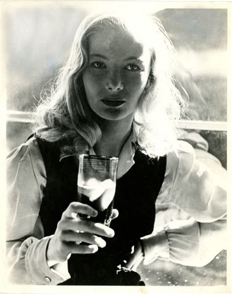 Black And White Photograph Of A Woman Holding A Wine Glass