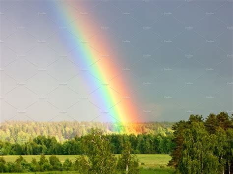Rainbow Over Forest Cloudy Landscape Nature Stock Photos ~ Creative