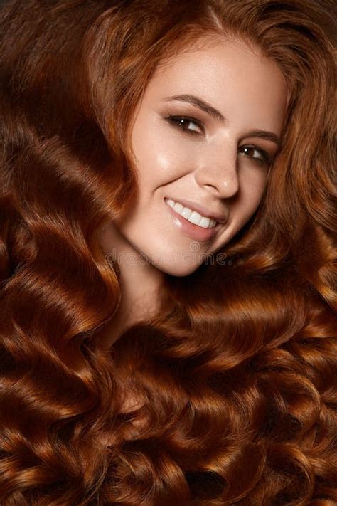 Attractive Ginger Woman With Wave Hairstyle Curly In Studio With Smile