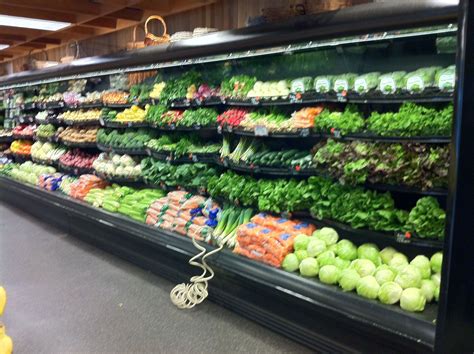 rounded produce shelves | Grocery store, Store design, Grocery