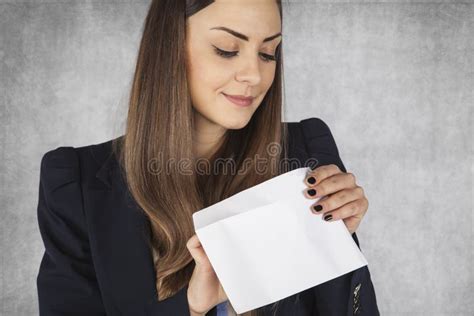 Businesswoman Looks Into The Envelope Stock Image Image Of Money