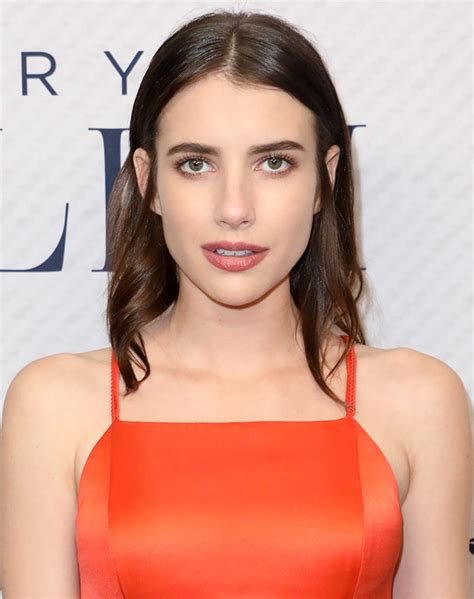 Braless Emma Roberts With Shoulder Length Hair Tucked Behind Ears