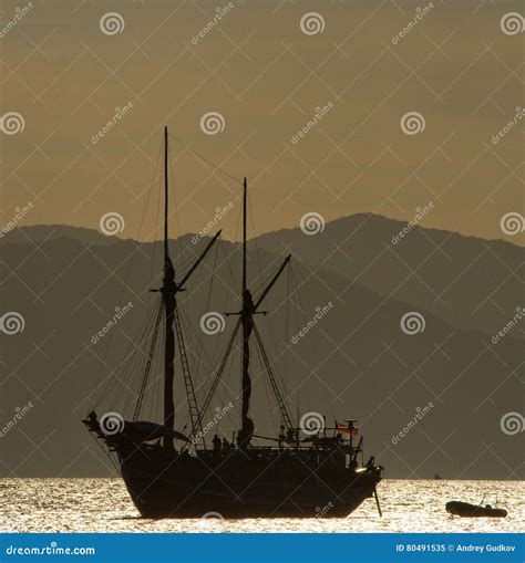 Sailing Ship On The Sea At Sunrise Sunset Indonesia Islands Stock