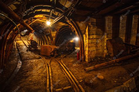 Premium Photo Underground Mining Tunnel With Rails