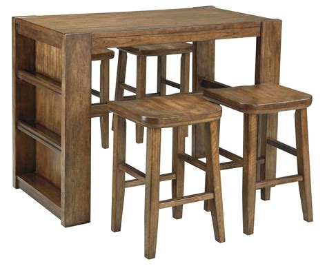 Chairs have faux leather seats. Birnalla Rectangular Counter Height Storage Table from ...