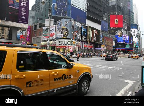 Broadway With Evening Traffic And Neon Signs Stock Photo Alamy