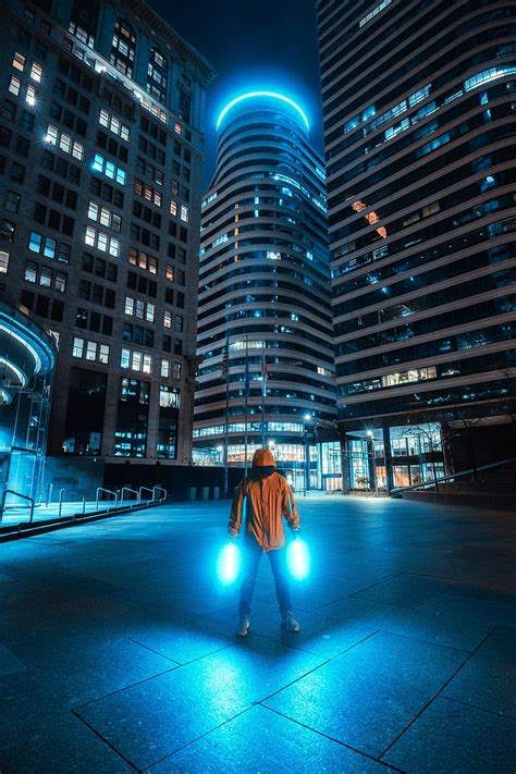 Man Neon Light City Night Buildings Hd Phone Wallpaper Peakpx