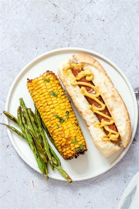 Looking to shake things up at your next cookout? Easy Air Fryer Hot Dogs In 8 Minutes - Recipes From A Pantry