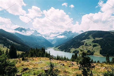 Scenic View Of Lake And Valley In Austrian Alps Scenic Scenic Views