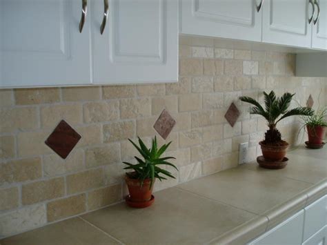 The water will go to the backsplash and drip to the dripping pan. Subway tile with diamond accents. | Glass tile backsplash ...