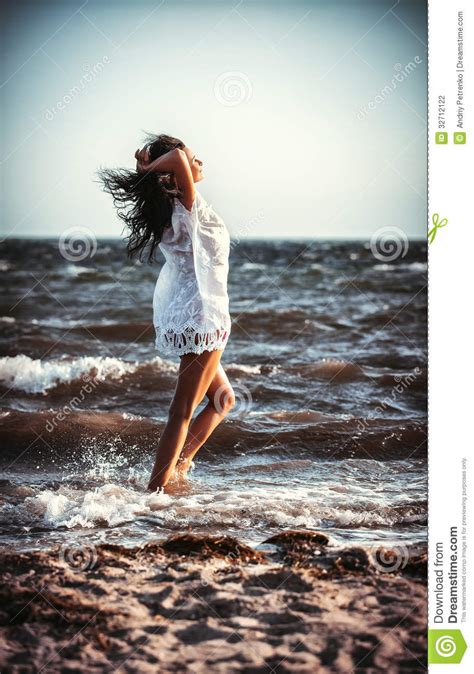 Woman In A White Dress On The Beach Stock Photo Image Of Positive