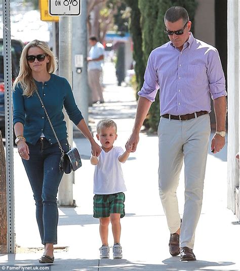 Reese Witherspoon Cradles Son Tennessee During Family Outing In La Daily Mail Online