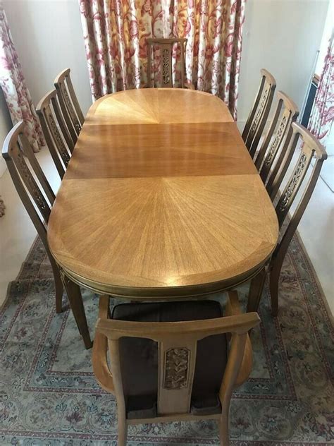 As a general rule, extending dining tables fall into two camps: John Lewis super quality extending dining table with 2 ...