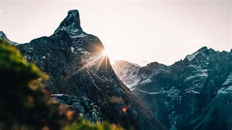 Download Wallpaper 1366x768 Mountains Peak Sun Sunlight Landscape