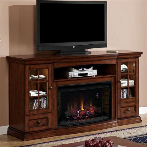 Corner electric fireplaces combine the benefits of an electric fireplace with an elegant piece of furniture that can be tucked away into a corner of your many corner electric fireplaces can hold tvs on top and also act as an entertainment center with space available for your electronic devices. entertainment center with fireplace | Seagate Electric ...