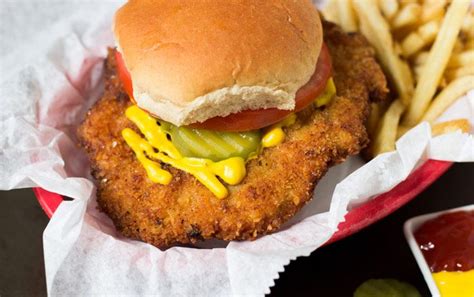 Maybe what my mother said about carnival people was true ? Iowa-Style Pork Tenderloin Sandwich Recipe | Pork tenderloin sandwich, Pork tenderloin recipes ...