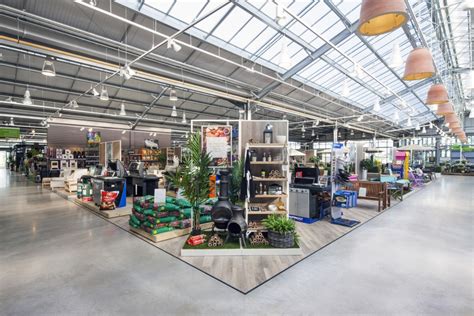 Whether you're looking for a tool that let's you sit and kneel easily, a solar powered sensory lights, or a unique canopy seat for your backyard. Wyevale Garden Centre store design, by Dalziel and Pow