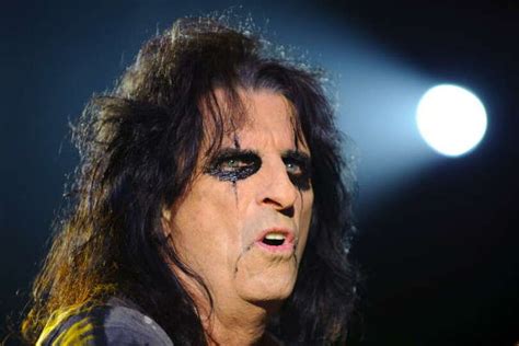 Alice Cooper Typically Wears A Lot Of Black Eye Makeup And On Photo