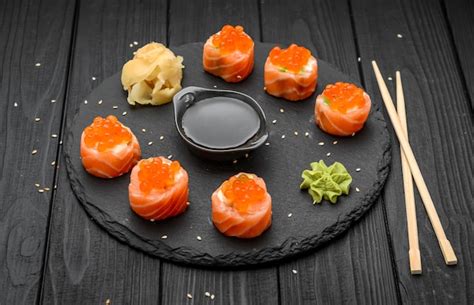 Premium Photo Salmon Sushi Rolls On Black