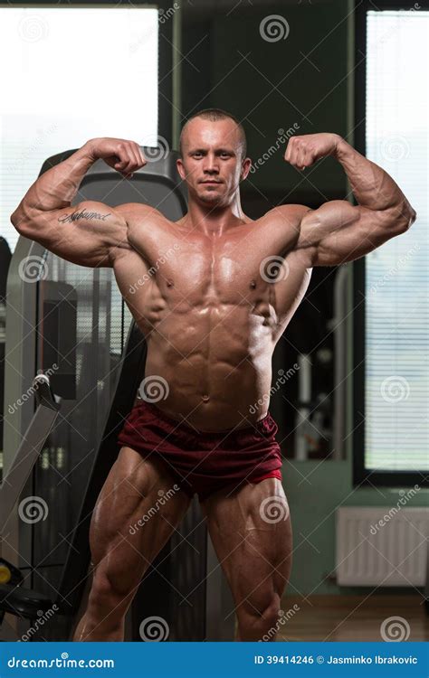Bodybuilder Performing Front Double Biceps Pose Stock Photo Image Of