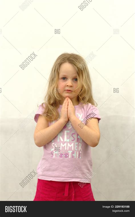 Little Girl Praying Image And Photo Free Trial Bigstock