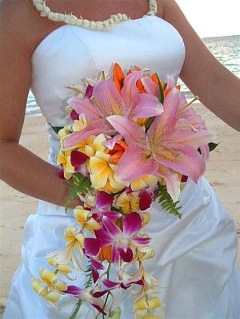 Palm leaves, and monstera (swiss cheese plant) leaves make an excellent base on which to create any type of large venue arrangement. Tropical Wedding - Bouquet #2057716 - Weddbook