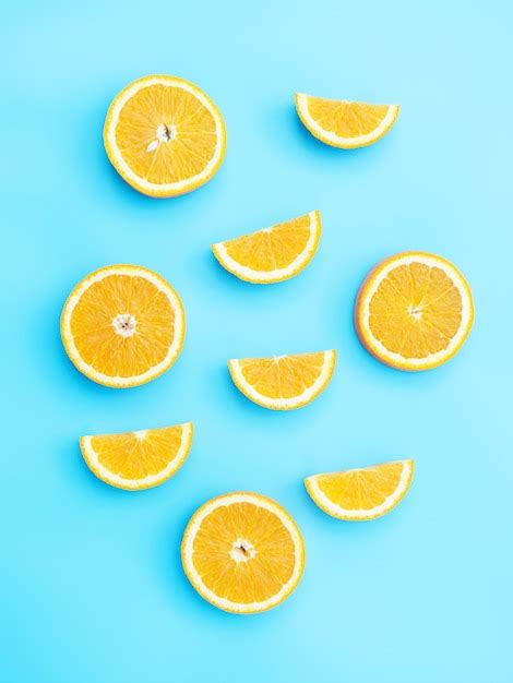 Premium Photo Oranges Fruit On A Blue Background