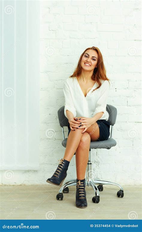 Young Happy Businesswoman Sitting On The Chair Stock Photo Image Of