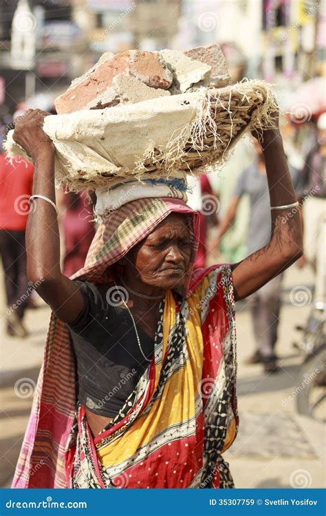roma woman carries bricks on his head editorial stock image image of close exploitation