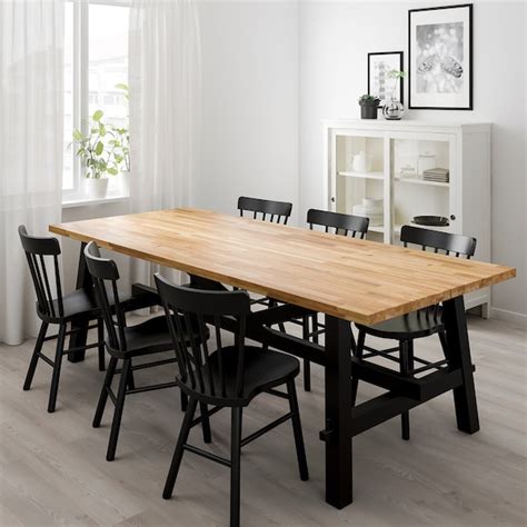 Playing games, helping with homework or just lingering after a meal, they're where you share good times with family and friends. SKOGSTA / NORRARYD Tafel met 6 stoelen - acacia, zwart - IKEA