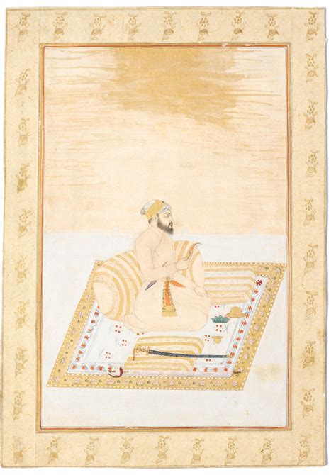 bonhams a mughal prince seated on a terrace holding a sarpech his tulwar lying on a cushion