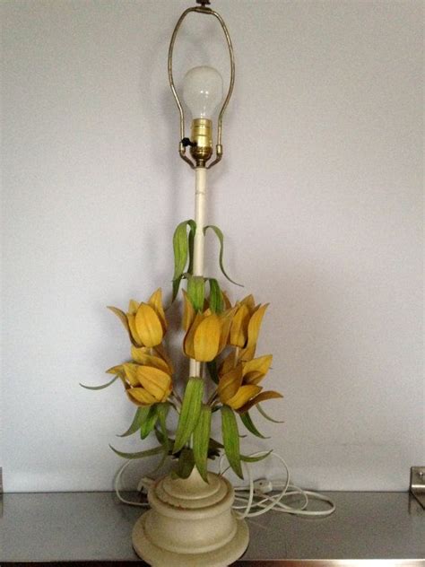 Check out our metal flower vase selection for the very best in unique or custom, handmade pieces from our vases shops. metal lamp with tulips | Metal flowers, Flower lamp, Metal lamp