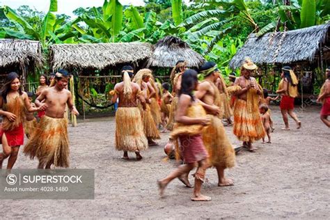 iquitos peru amazon jungle a yagua tribe does a cermonial dance in their village square