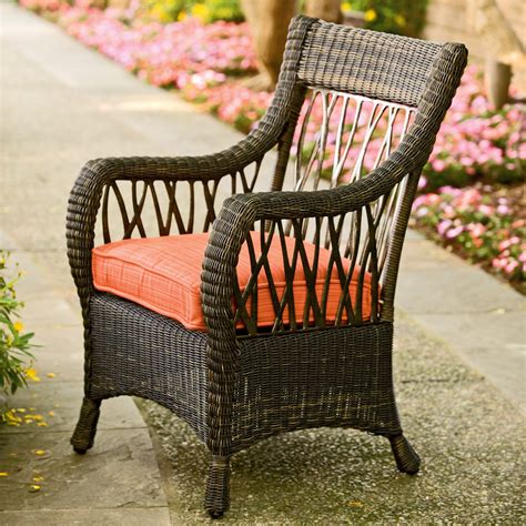 Wicker dining chairs typically have a construction that's only part wicker; Woodard Serengeti All Weather Wicker Dining Arm Chair ...