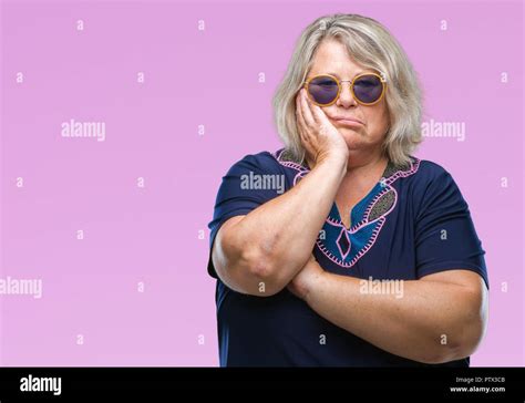 Middle Age Senior Woman Wearing Sunglasses Over Isolated Background