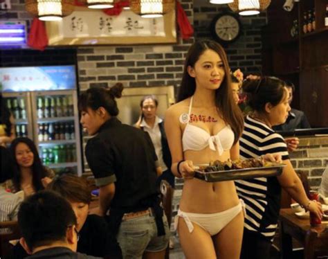 Enquizzle Photos See The Restaurant In China Where Waitresses Waiters Work Half Naked