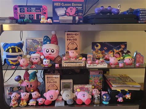 Some Of My Kirby Collection That I Have Displayed In My Living Room
