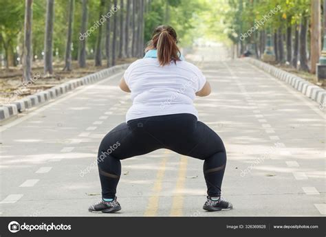 Back View Of Unidentified Fat Woman Squatting Stock Photo By